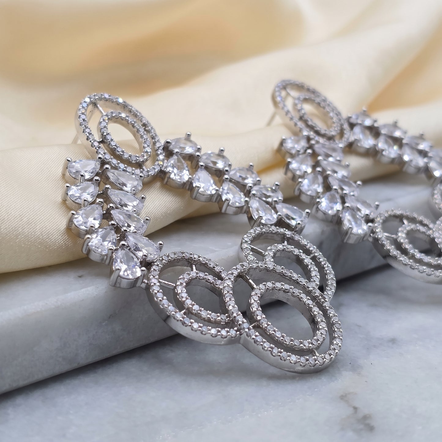 Dua · Silver AD Drop Hoops | Allure Jewelry by Rushi